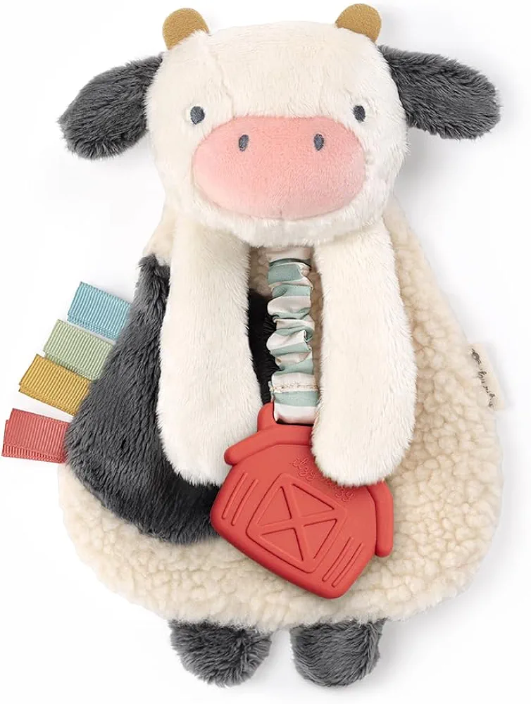 Itzy Ritzy - Itzy Lovey Including Teether - Baby Lovey with Teether, Textured Ribbons & Dangle Arms - Features Crinkle Sound, Sherpa Fabric and Minky Plush (Cow)